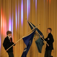 DETSA President, Davey McGinnis carrying the flag of the state of Delaware.